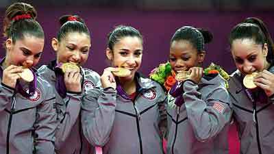 As a team, U.S. women gymnasts strike gold